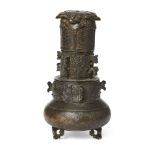 Japanese bronze parfumier, 19th century, intricately carved on tripod base, 15cm high In overall