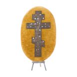 A Russian Orthodox three-bar cross, 20th century, cast in bronze and mounted on velour, depicting