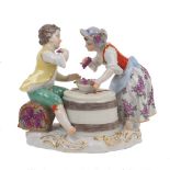 A Meissen figure group, 'Vine Harvest', 20th Century, depicting an 18th Century boy and girl with