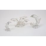 Three pieces of Lenox Crystal glassware, including two individual breeching dolphins and one