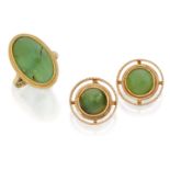 A chrysoprase ring and earrings by Flavia, the ring with single oval cabochon chrysoprase in