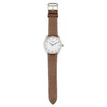 A stainless steel quartz wristwatch, by Hermes, model ref. AR5. 510, the white enamel dial with
