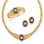 A suite of modern Egyptian, revivalist style jewellery, comprising: a necklace with central crescent