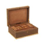 A gilt and suede jewellery case, by Asprey, of rectangular form with beige suede sides and hinged