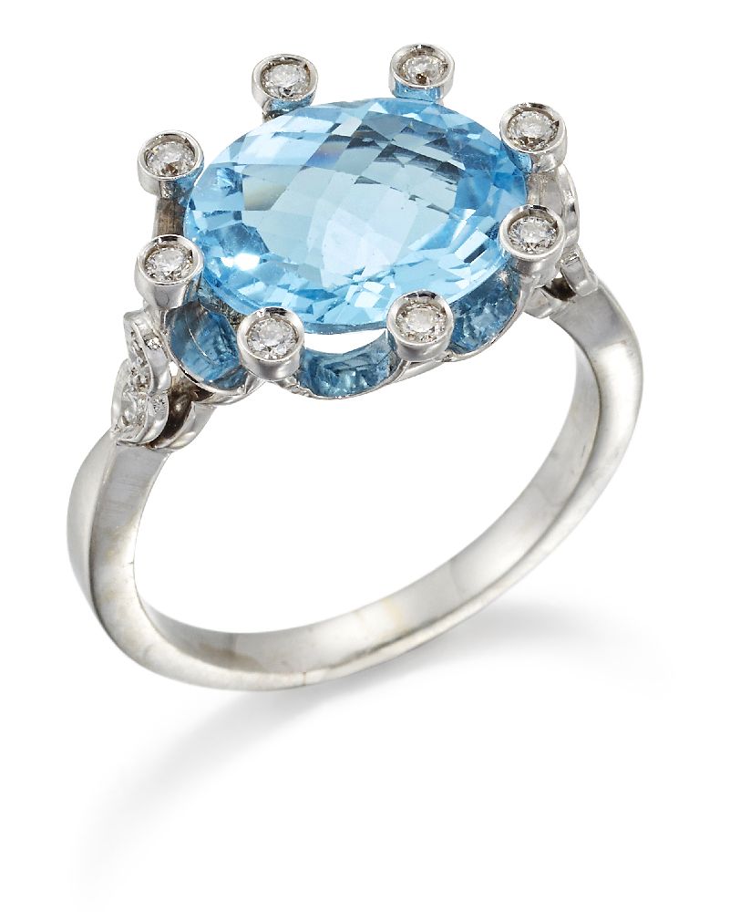 Amendment: one diamond has become detached from mount but diamond is present with lot A topaz and