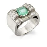 An Art Deco single emerald and diamond ring, of Odeonesque design, the centre single claw-set