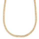 A flexible necklace, composed of series of engine-turned herring bone design links, Israeli assay