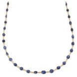 A sapphire necklace, composed of a line of vari-shaped cabochon sapphire collets, with twin fancy