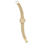 A lady's 18ct gold and diamond quartz wristwatch, by Omega, the champagne dial with diamond dot