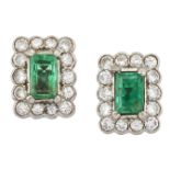 A pair of emerald and diamond cluster earstuds, the cut-cornered rectangular emerald single stones