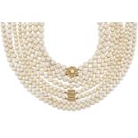 Four cultured pearl necklaces, comprising: one composed of two rows of uniform cultured pearls,