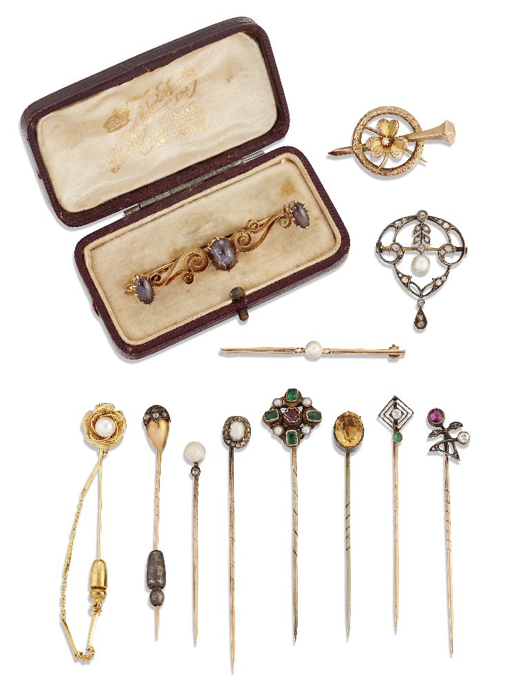 Eight various stickpins and four brooches, stickpins include an Art Nouveau diamond and ruby two