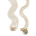 Two cultured pearl necklaces, the first a single row of uniform cultured pearls, to an opal circular
