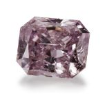 An unmounted fancy intense purplish pink diamond, the cut-cornered rectangular modified brilliant-