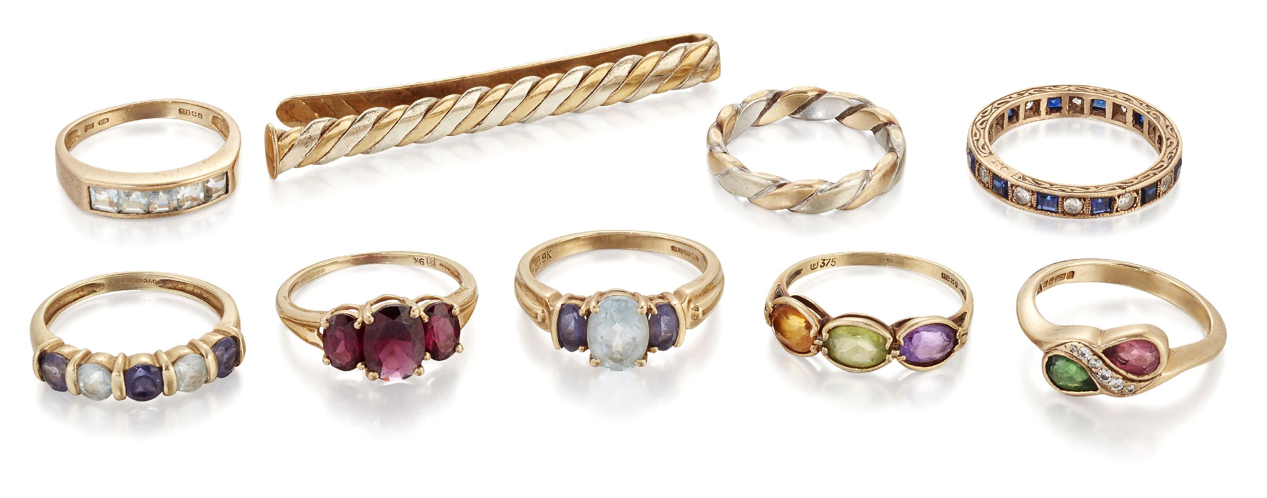 Eight various 9ct gold and gem synthetic gem rings and a 9ct gold tie slide, rings include: a 9ct