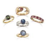 A group of diamond and gem rings, comprising: a claw-set star sapphire single stone ring with ridged