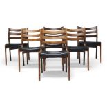 A set of six rosewood dining chairs in the manner of Erik Buchs, together with a rosewood