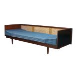 Dennis Young (British), a teak and caned sofa, c.1960, A scarce model, with caned back and fold down