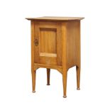 An Arts and Crafts oak bedside cabinet manufactured by Lebus, Louis & Harris, c.1905, stamped to