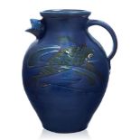 Charles Hubbert Brannam (British 1855-1937), an earthenware slipware 'Fish' jug, Early 20th Century,