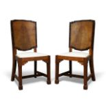 A pair of Art Deco walnut and Macassar side chairs, c.1930, The shaped walnut veneered and