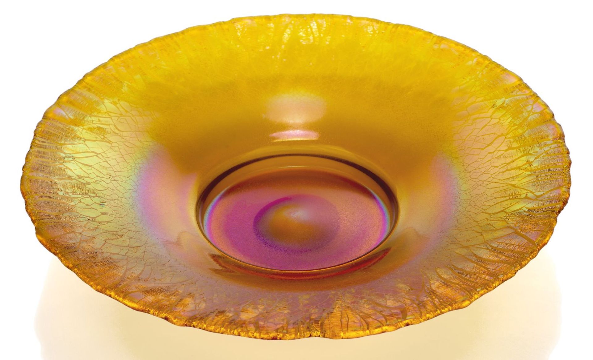 Attributed to WMF, a 'Myra' iridescent glass dish, c.1930, ground out pontil, Decorated with orange,