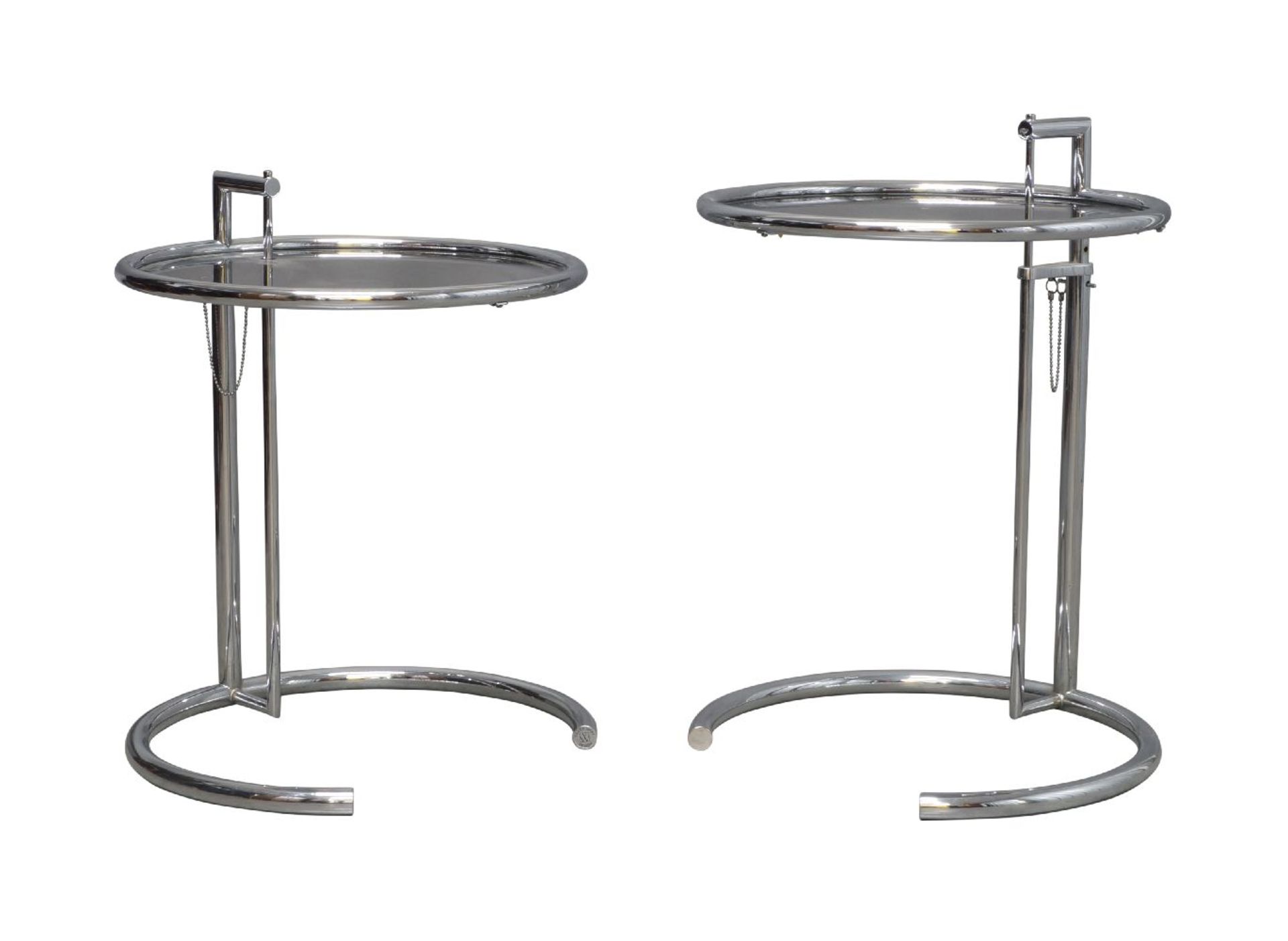 Eileen Gray (British 1878-1976), a pair of model 'E1027' glass and chrome side tables for Vereinigte