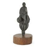 Leon Underwood, British 1890-1975 - Venus of Lespugue; bronze on circular wooden base, inscribed