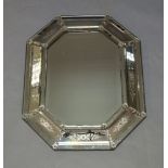 A Venetian oblong octagonal wall mirror, probably early 20th Century, with a central bevelled edge