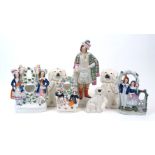 A group of seven Victorian Staffordshire figures, to include a large figure of William Wallace, 39cm