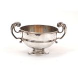 An Edwardian silver Walker & Hall centrepiece bowl, Sheffield, c.1902, the circular body raised on a