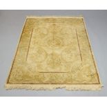 A French hand knotted woollen runner rug, Aubusson design, floral patterns in panels, on a cream
