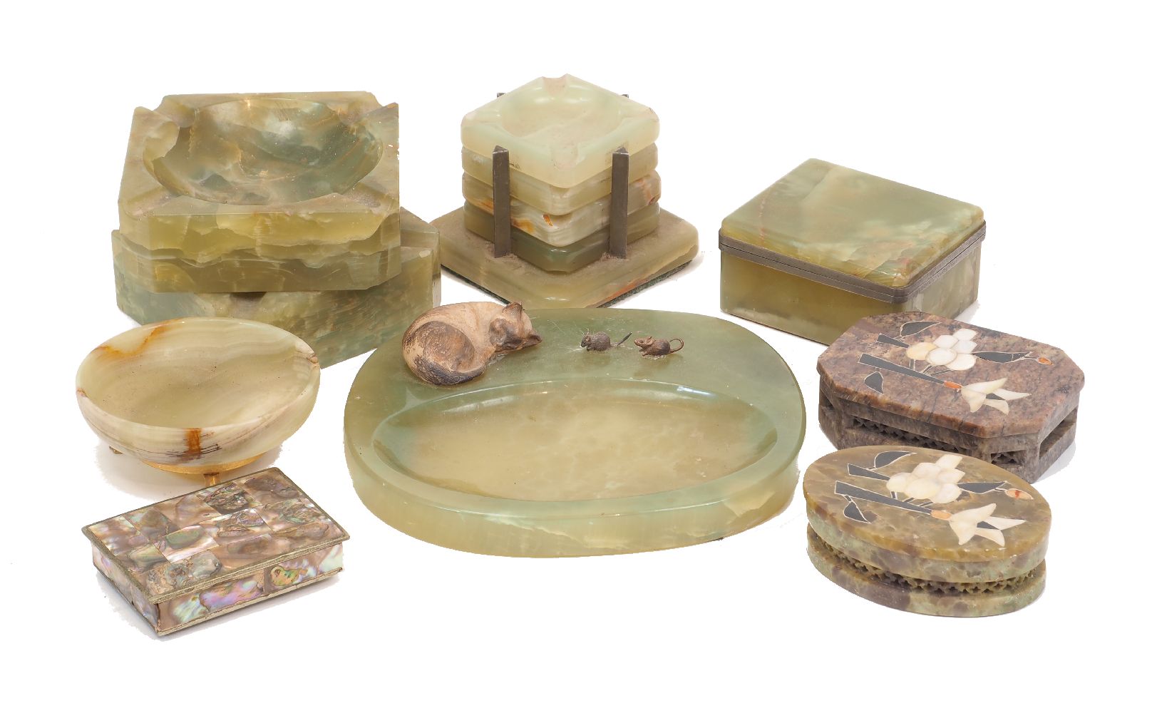 A group of onyx objects, mid 20th century, to include an ash-tray mounted with a model of a cat