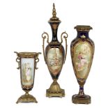 Three French Sevres style porcelain gilt-metal mounted vases, circa 1900, each painted with panels