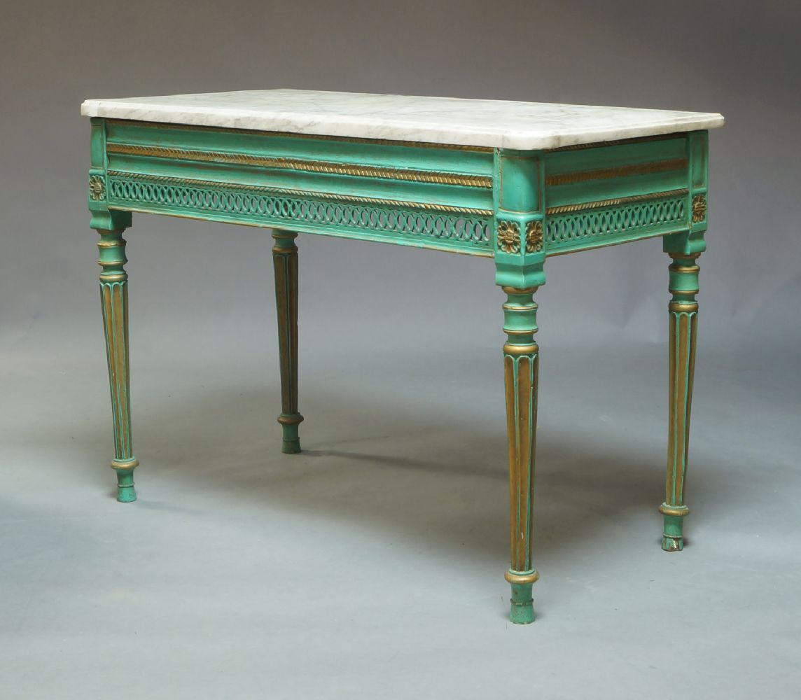 A Louis XVI painted marble topped console table, the frame with gilded and pierced decoration,