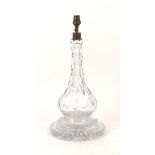 A table lamp, 20th century, of inverted baluster form on stepped base, in cut glass, mould-