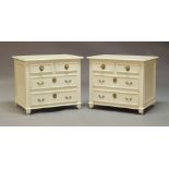 A pair of modern cream painted bedside chests, probably early to mid 20th Century, each comprising