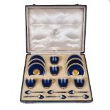 A Royal Worcester porcelain coffee set for six, bearing date marks for 1913, in navy blue colour way