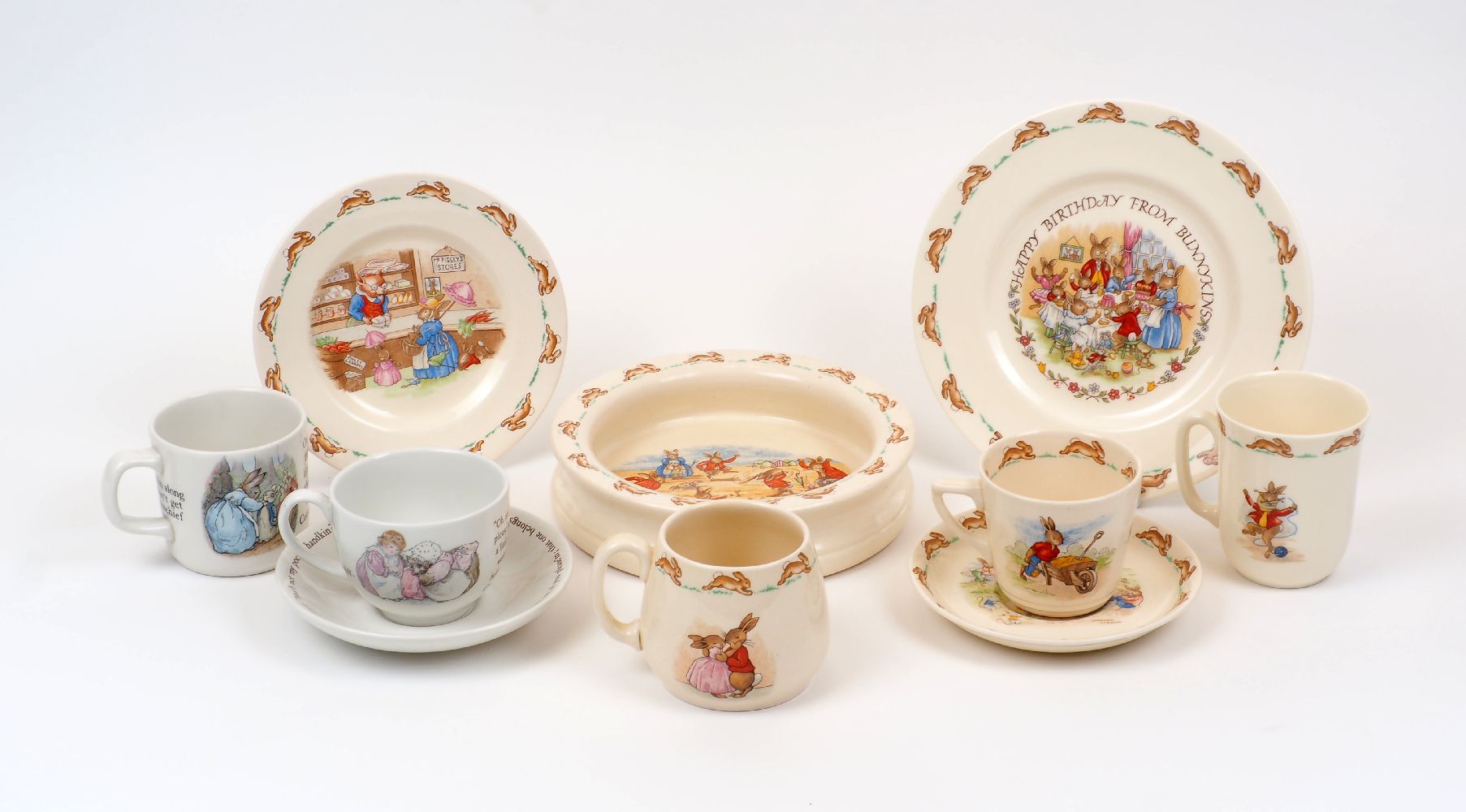 A group of Royal Doulton 'Bunnykins' table wares, to include a child's cereal bowl, teacup and