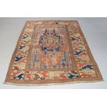 A Kazak rug, the main field with hooked motifs and geometric designs, polychromatic geometric