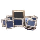 Seven silver mounted photo frames including three examples by Carrs of Sheffield and three