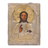 A Russian icon, early 20th Century, depicting Christ blessing with open book, oil on panel with a
