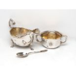 A cased silver porringer and spoon, the porringer Birmingham, c.1930, William Greenwood & Sons,