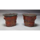 A pair of Japanese stained wood and parcel gilt lidded barrels, with later glass tops, having