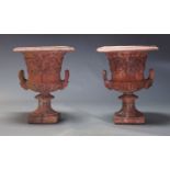 A pair of pink terracotta Campana garden urns, late 19th, early 20th Century, each with gadrooned