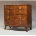 An early 19th Century mahogany bow fronted chest of drawers, circa 1830, comprising two short over