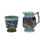 Two pieces of Majolica ware, 20th century, to include; a jug, earthenware, on stepped foot, with