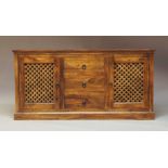 A contemporary hardwood sideboard, Of recent manufacture, fitted with two lattice panelled