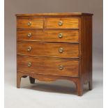 An early 19th Century mahogany bow fronted chest of drawers, circa 1830, fitted with two short