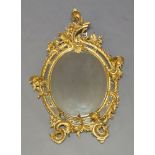 A Rococo Revival style gilt framed wall mirror, in the manner of Thomas Chippendale, of recent